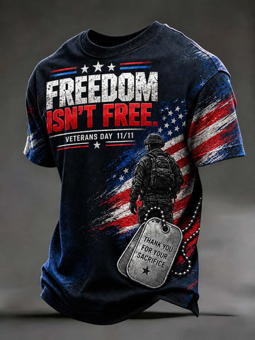 A dark navy blue graphic t-shirt featuring a distressed American flag design, a soldier silhouette, and a dog tag with the text 'THANK YOU FOR YOUR SACRIFICE' and 'VETERANS DAY 11/11'.
