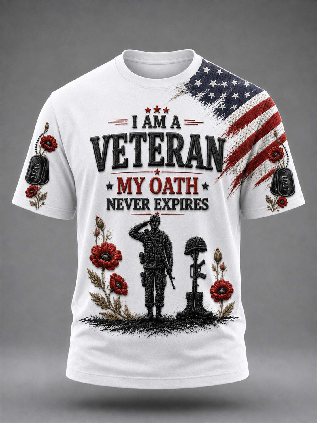 White short-sleeve graphic T-shirt with a patriotic veteran design. The front features the text 'I AM A VETERAN MY OATH NEVER EXPIRES' in black and red, with a black soldier silhouette, red poppies, and a distressed American flag on the right shoulder and sleeve.