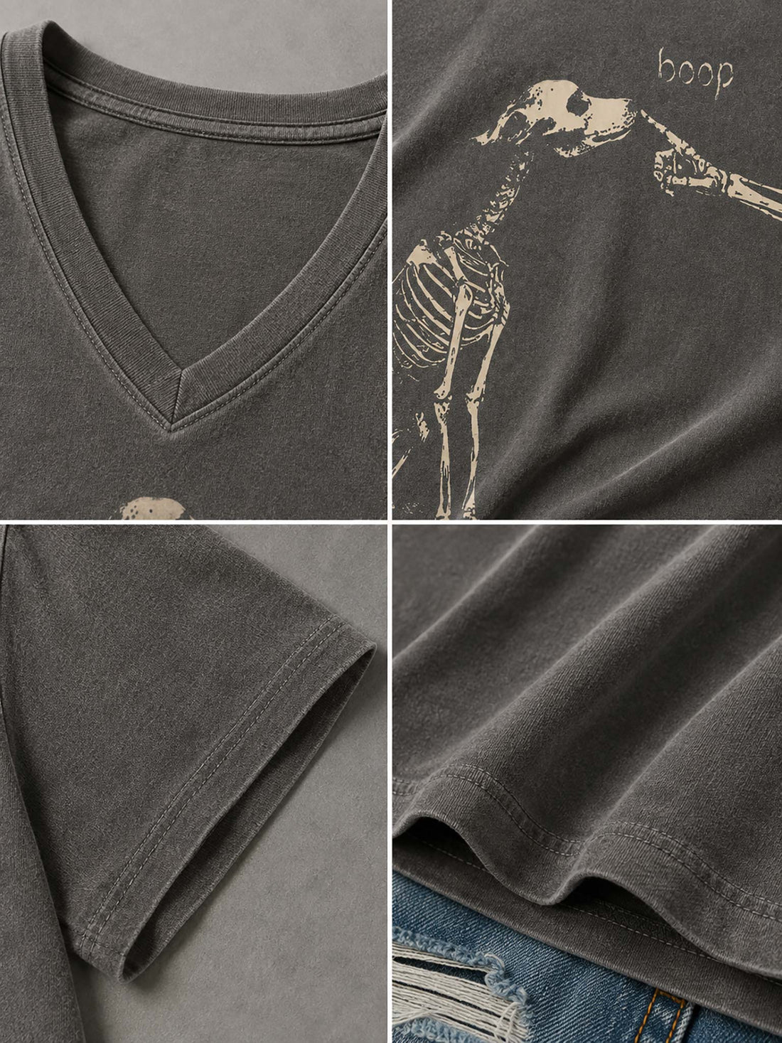 A dark gray v-neck t-shirt with a distressed beige graphic of a skeleton giraffe and the word 'hoop', styled on a wooden hanger with blue denim shorts against a textured gray background.