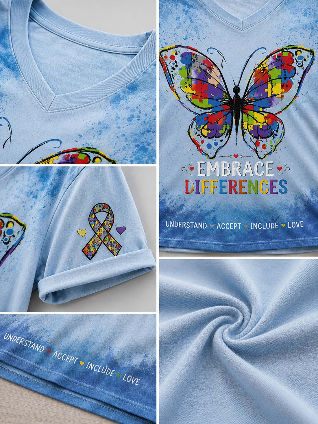 A woman wearing a light blue V-neck graphic T-shirt with a large colorful butterfly print, the words 'EMBRACE DIFFERENCES,' and a small awareness ribbon on the sleeve, paired with blue jeans.