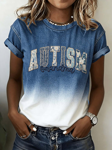Person wearing a blue and white t-shirt with 'AUTISM Grandma' text.