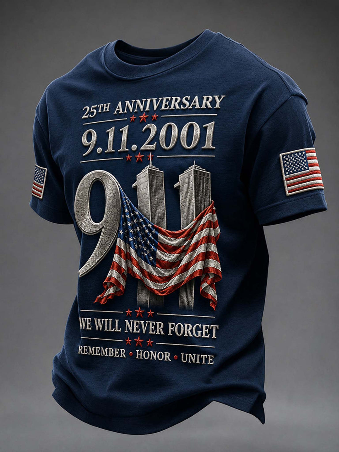 A navy blue short-sleeve t-shirt with a detailed 9/11 memorial graphic. The graphic features the text '25th Anniversary 9.